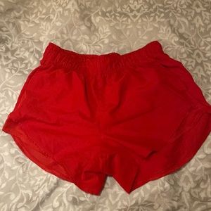 Red athletic shorts. Size S